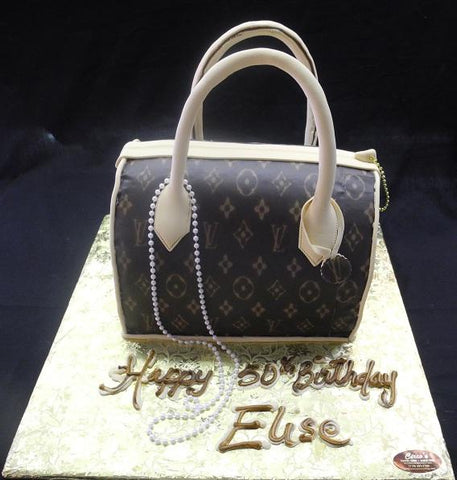 Masters Cakes - Louis Vuitton cake with edible duffel bag