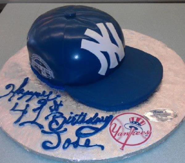 New York Yankees baseball jersey cake with glove and hat.  Baseball  birthday cakes, Yankee baseball cake, Yankees birthday