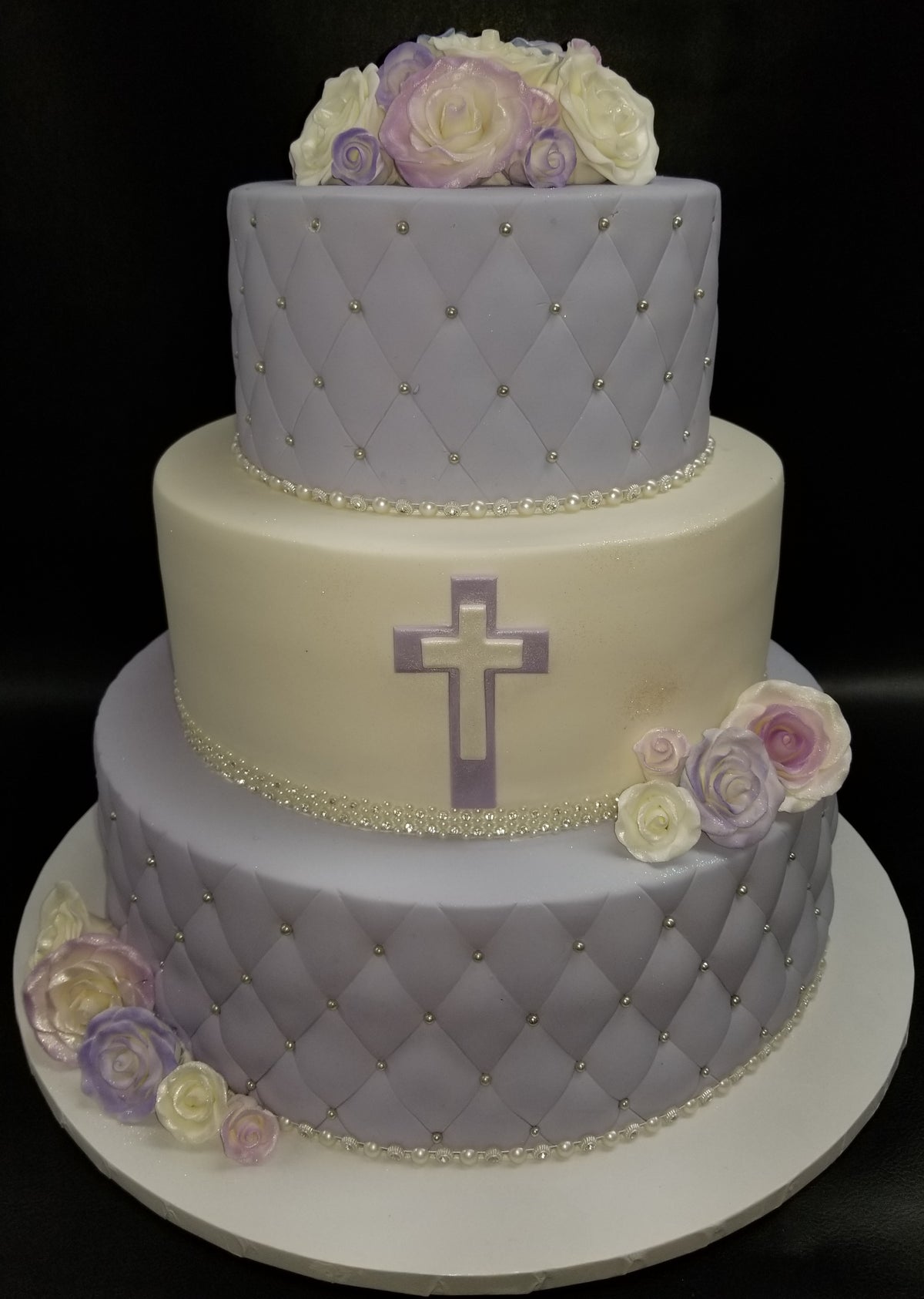 Purple and white with sugar roses. R061