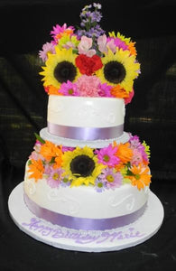 Lavender and White Birthday Cake with Fresh Flowers on Top - B0558