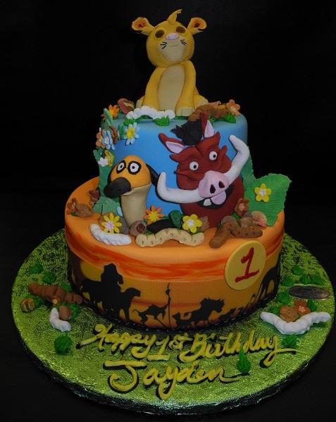 Delicious Cakes And Beautiful Crafts - Lion King themed First Birthday cake  for baby Vianney! Simba,Pumbaa and Timon and all other decorations handmade  with fondant. Happy Birthday baby Vianney!  https://www.instagram.com/deliciouscakes_beautifulcrafts ...