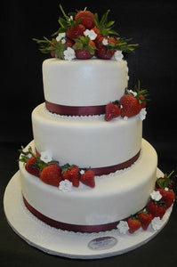 fresh strawberries, white cake, fruit blossoms