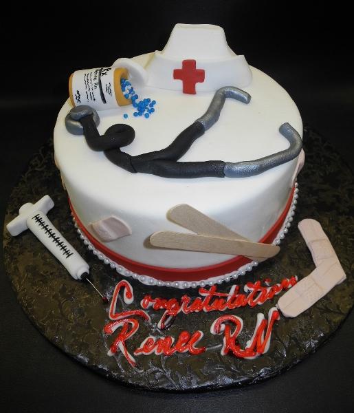 Nurse's Fondant Cake with Edible Nursing Tools, pills, syringe, band-aid, stethoscope,  