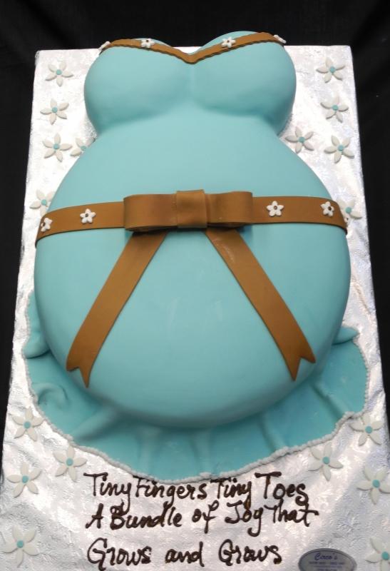 White Dress with Blue Brown Fondant Belly Cake for Baby Shower