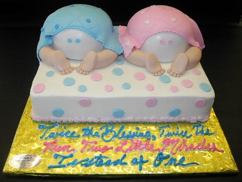 Baby Bottom Twin Cake with blue and pink decorations