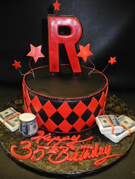 Red and White Fondant Cake with Edible Letter and Money to decorate