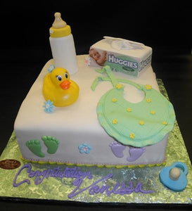 Ivory Baby Shower Square Cake with Edible Bottle, Huggies Box, Bib, and Pacifier 