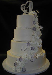 Whip Cream Wedding Cake with Flowers and Butterflies Cascading Down