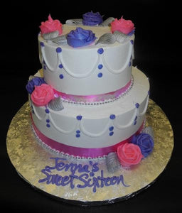 Whip Cream Sweet 16 Cake with buttercream flowers and cream dots 