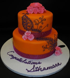 Orange Fondant Cake with  Purple Henna and Pink Flowers 