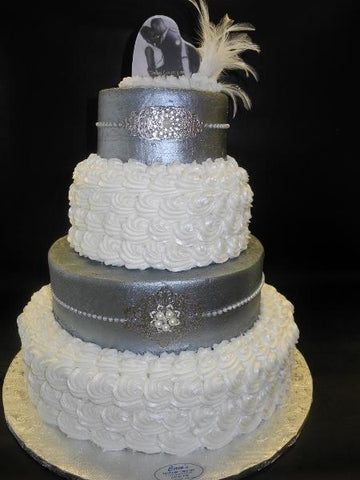 Rosette  and silver icing wedding cake 