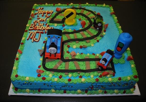 Thomas the train Whip cream cake with fondant train tracks 