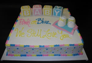 Gender reveal icing cake with fondant decoration