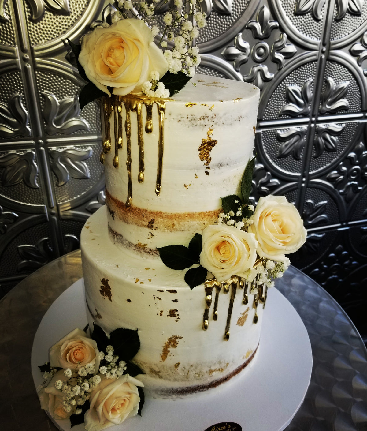 Naked cake with Gold embellishments and fresh flowers W195