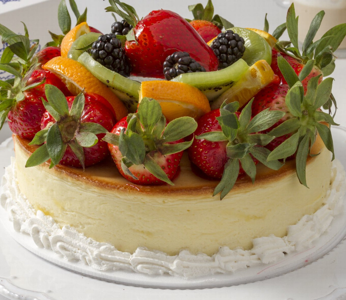 Cheesecake with mixed fruits. For Local Delivery or Curbside Pickup ONLY